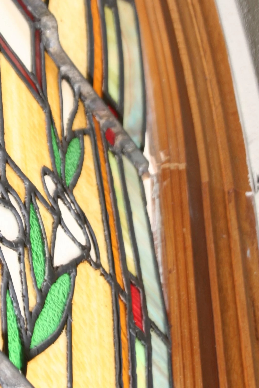 Bulging in a stained glass window