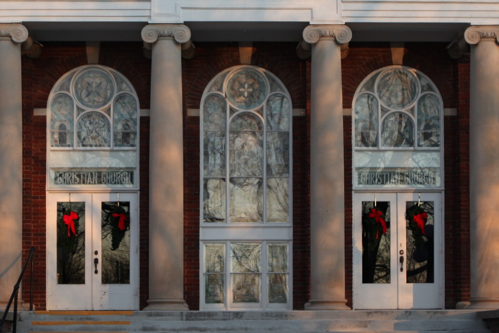 Close-up of a protective glass covering over a stained glass window